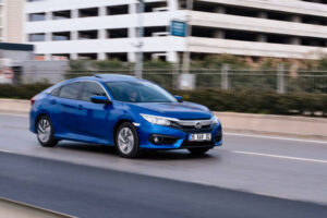 Izmir, Turkey - March 09, 2019 :Honda Civic model driving on the highway in Izmir. Panned photography, high speed, motion blur