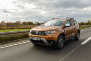 New 2018 Dacia Dustar 4x4 on the streets. Blurred background. Car in motion.